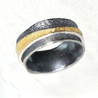 "drehbarer Ring im Ring" Silberring  teilvergoldet, teilgeschwärzt