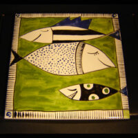 Kachel "Träumende Fische" im grünen Meer