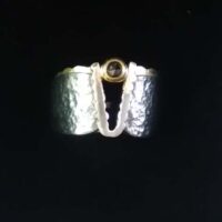 "Granat" Silberring, teilvergoldet