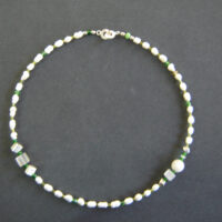 „Weiße Perlen im grünen Meer"