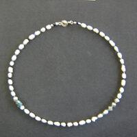 „Weiße Perlen im blauen Meer"