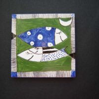 Kachel "Träumende Fische" im unterwegs grünen Meer